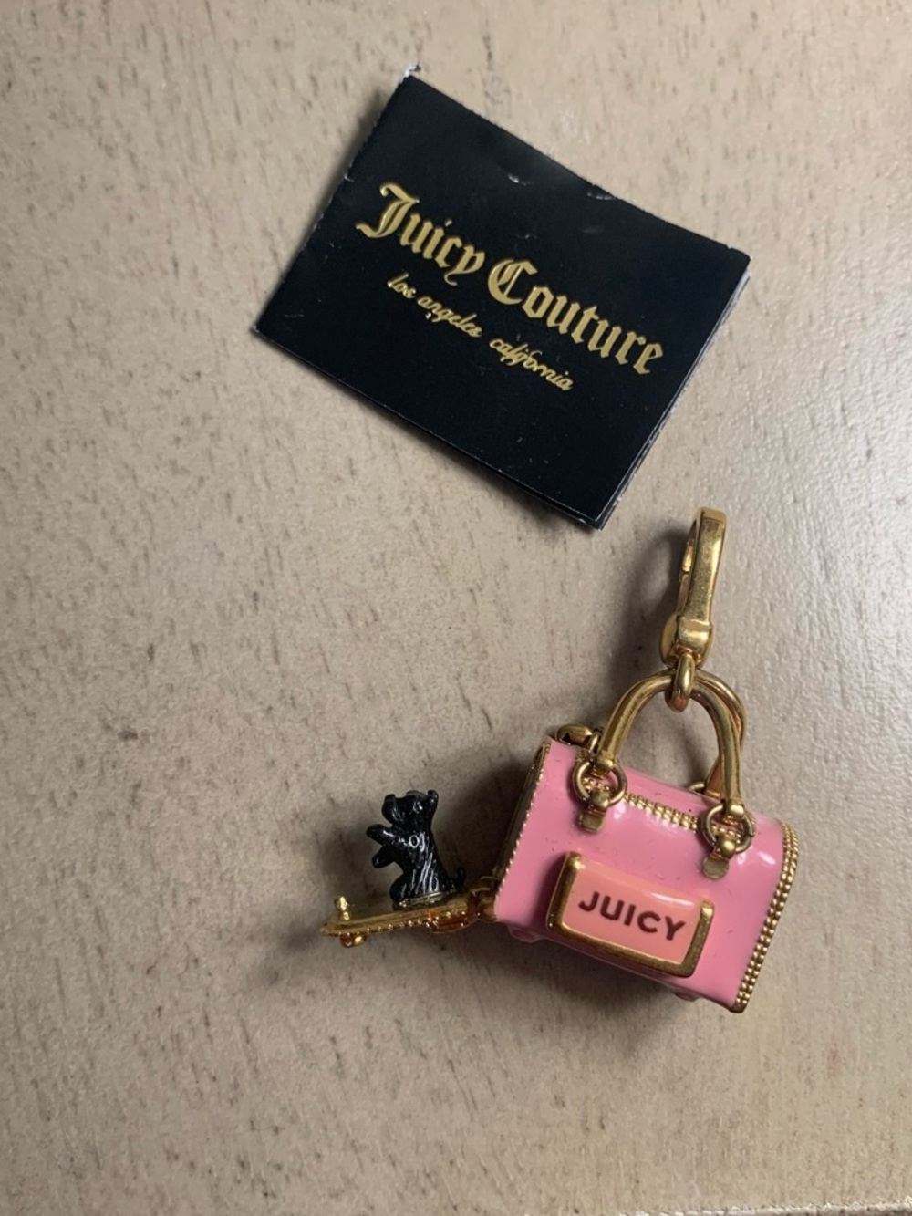 Juicy Couture Pink and Gold Mini Purse Key Charm with Black Dog